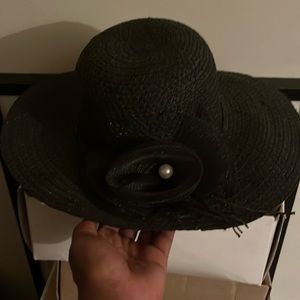 Women’s black knit hat and women’s tan hat